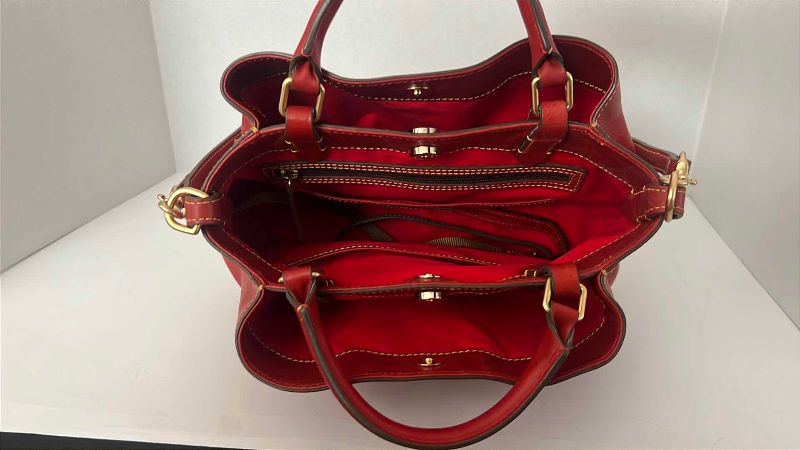 Photo 1 of DOONEY & BOURKE RED FLORENTINE BRENNA PURSE 12” X 12”