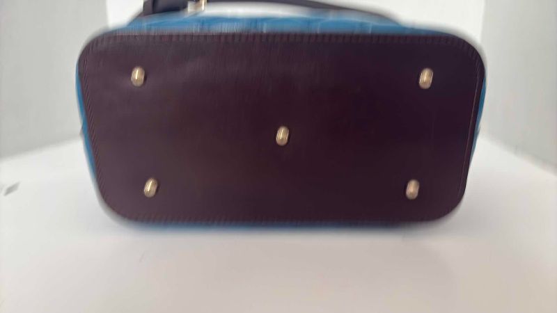 Photo 1 of DOONEY AND BOURKE BLUE BARLOW HANDBAG 12”X12”