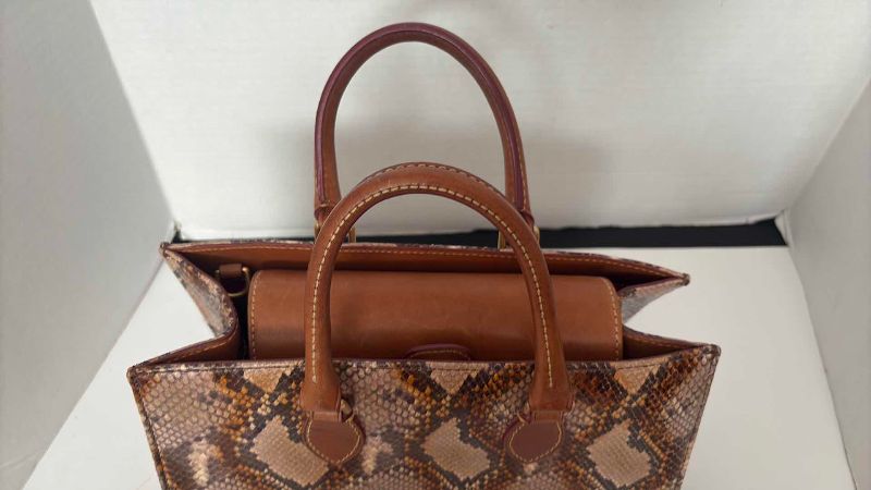 Photo 1 of DOONEY & BOURKE BROWN SNAKE HANDBAG 12”X12”