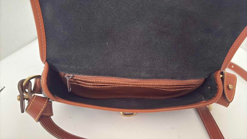 Photo 1 of DOONEY & BOURKE BLACK PEBBLE CROSS BODY BAG 10”X8”