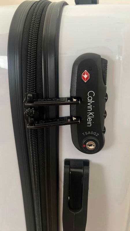 Photo 1 of CALVIN KLEIN HARD SIDE SPINNER WHITE SUITCASE 13” X 9” H 19”
