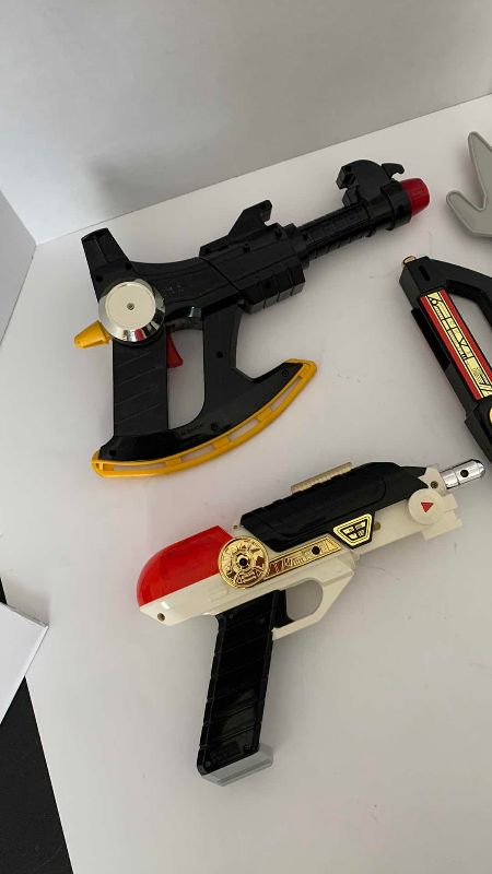 Photo 1 of VINTAGE MIGHTY MORPHIN POWER RANGERS GUNS AND KNIVES