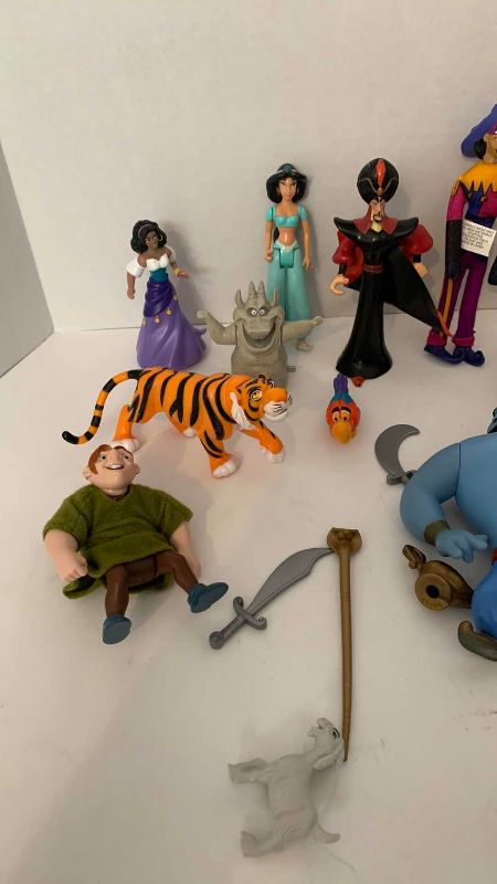 Photo 1 of ASSORTED DISNEY MOVIE TOYS AND CASE