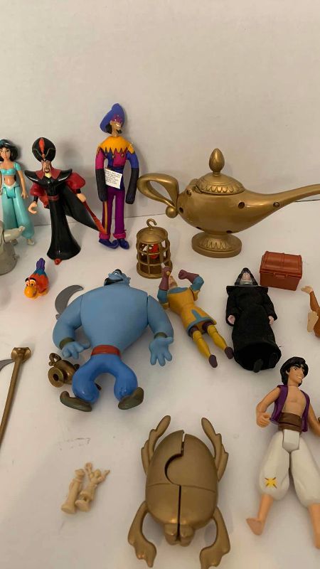 Photo 1 of ASSORTED DISNEY MOVIE TOYS AND CASE
