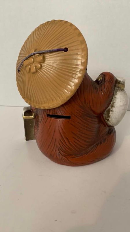 Photo 1 of VINTAGE CERAMIC TANUKI COIN BANK FIGURE 7”