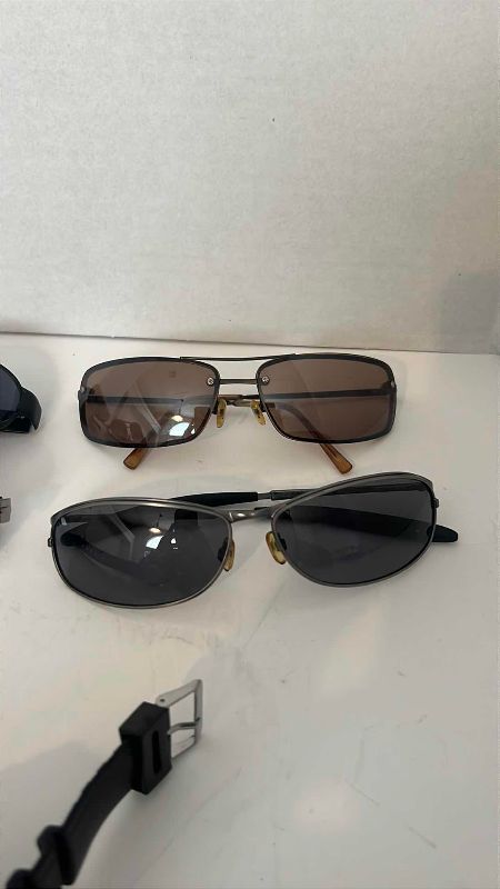 Photo 1 of SET OF 4 MENS SUNGLASSES AND SPORTS WATCH