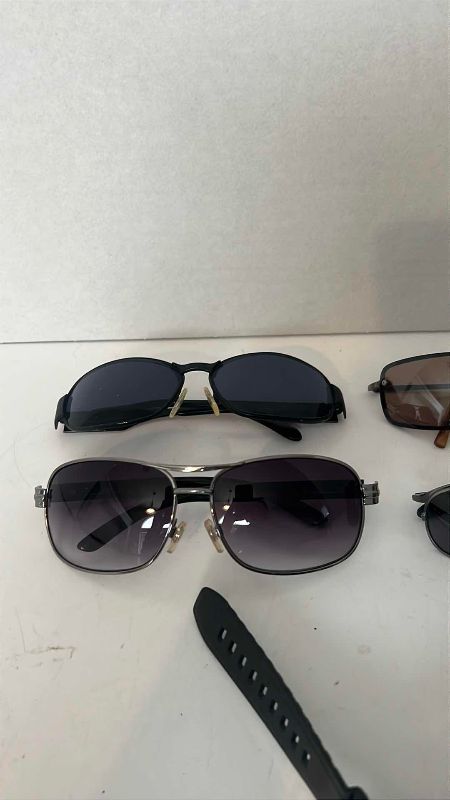 Photo 1 of SET OF 4 MENS SUNGLASSES AND SPORTS WATCH