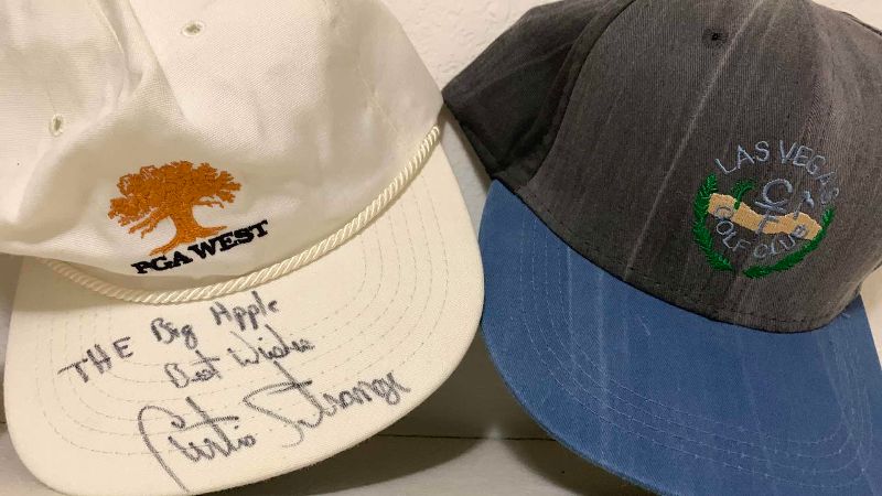 Photo 1 of 4-MENS GOLF CAPS ONE AUTOGRAPHED BY GOLFER CURTIS STRANGE