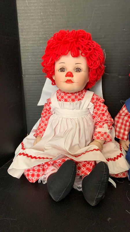 Photo 1 of 2-PORCELAIN RAGGEDY ANN AND ANDY DOLLS 20”