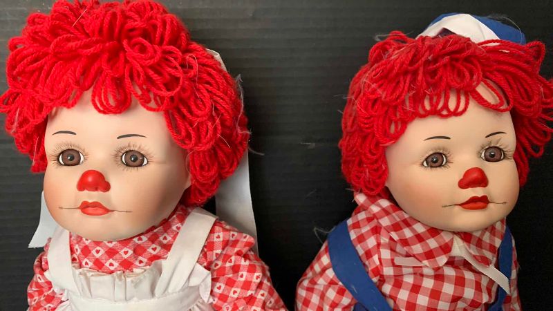 Photo 1 of 2-PORCELAIN RAGGEDY ANN AND ANDY DOLLS 20”