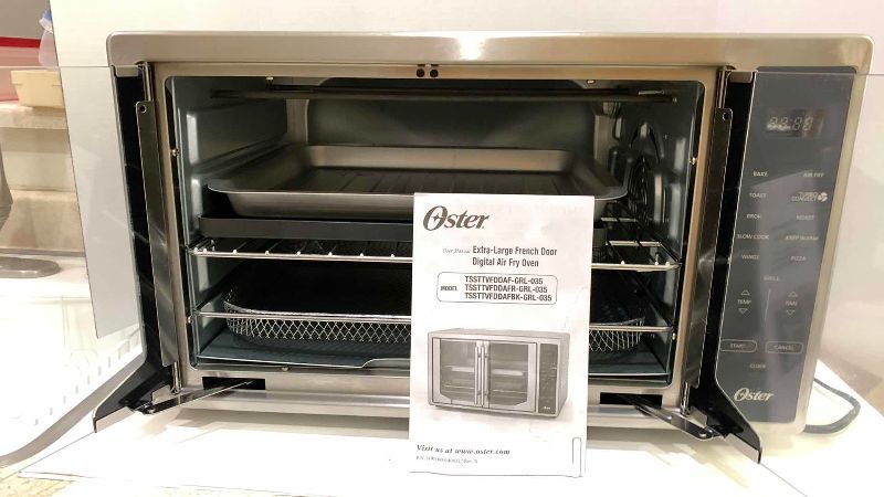 Photo 1 of OSTER EXTRA LARGE FRENCH DOOR DIGITAL AIR FRYER OVEN MODEL TSSTTVFDDAF-GRL-035