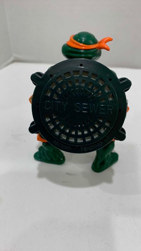 Photo 1 of VINTAGE TEENAGE MUTANT NINJA TURTLES SPEAKING MICHAELANGELO AND SPINNING DONATELLO ACTION FIGURES