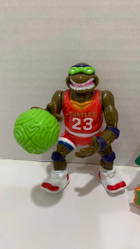 Photo 1 of VINTAGE TEENAGE MUTANT NINJA TURTLES SLAM DUNKIN DONATELLO, MIKE THE SURFER AND HOSE’EM DOWN DONATELLO ACTION FIGURES