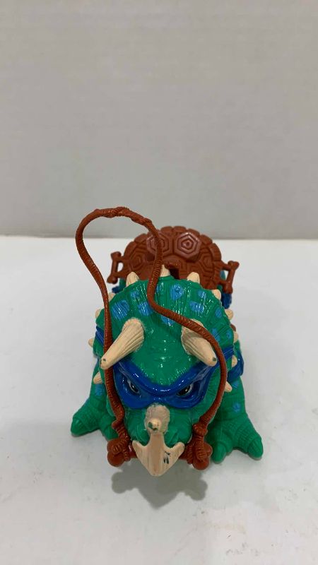 Photo 1 of VINTAGE TEENAGE MUTANT NINJA TURTLES DINGY DINO ACTION FIGURE