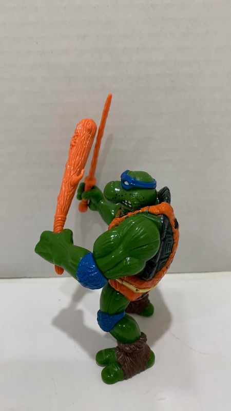 Photo 1 of VINTAGE TEENAGE MUTANT NINJA TURTLES CAVE TURTLE LEO ACTION FIGURE