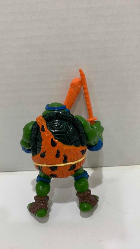 Photo 1 of VINTAGE TEENAGE MUTANT NINJA TURTLES CAVE TURTLE LEO ACTION FIGURE