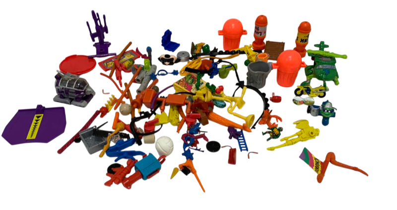 Photo 1 of VINTAGE TEENAGE MUTANT NINJA TURTLES ASSORTED WEAPONS AND GEAR