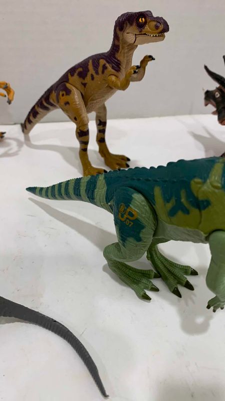Photo 1 of VINTAGE JURASSIC PARK DINOSAUR ACTION FIGURES