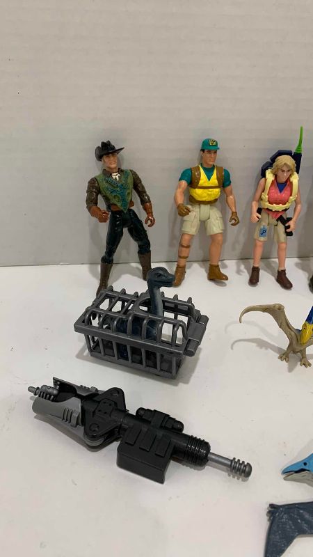 Photo 1 of VINTAGE JURASSIC PARK HUMANS, BABY DINOSAURS AND CAPTURE ACCESSORIES