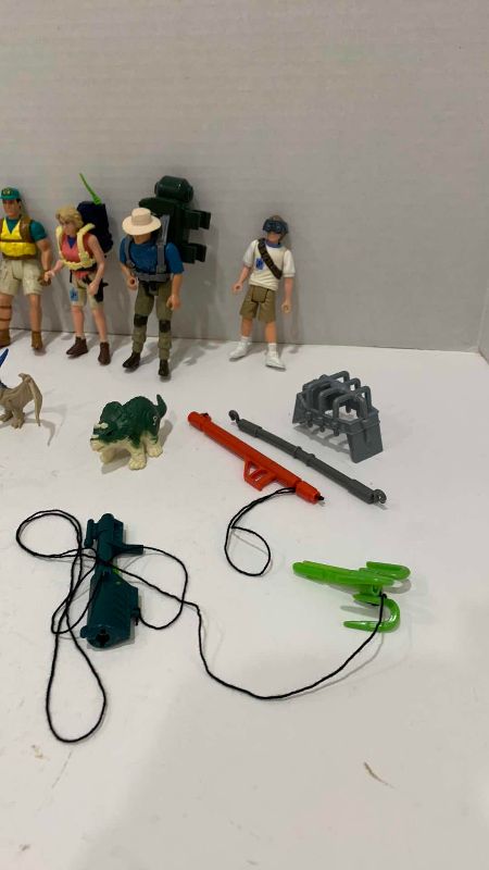 Photo 1 of VINTAGE JURASSIC PARK HUMANS, BABY DINOSAURS AND CAPTURE ACCESSORIES