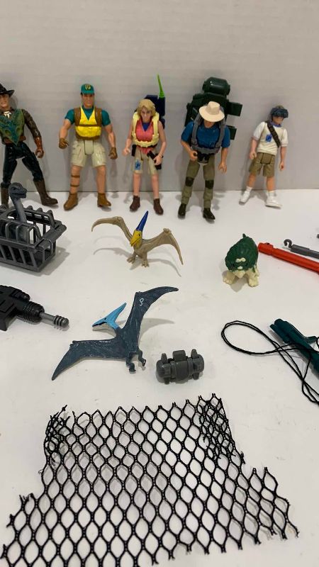 Photo 1 of VINTAGE JURASSIC PARK HUMANS, BABY DINOSAURS AND CAPTURE ACCESSORIES