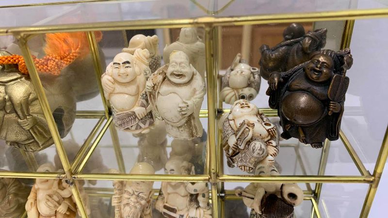 Photo 1 of VINTAGE HOTEI LAUGHING BUDDAH’S IN GLASS DISPLAY CASE