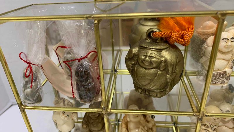 Photo 1 of VINTAGE HOTEI LAUGHING BUDDAH’S IN GLASS DISPLAY CASE