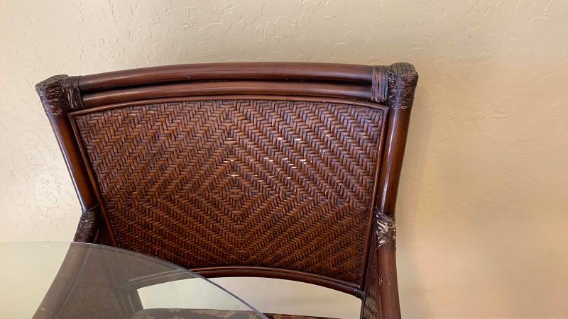 View 6 of DINING ROOM TABLE WITH GLASS TOP, RATTAN CHAIRS, AND CLAW FEET