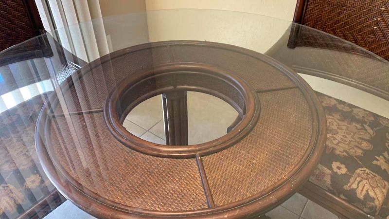 View 2 of DINING ROOM TABLE WITH GLASS TOP, RATTAN CHAIRS, AND CLAW FEET