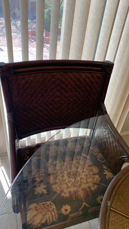 View 4 of DINING ROOM TABLE WITH GLASS TOP, RATTAN CHAIRS, AND CLAW FEET