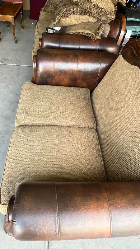 View 3 of BUTTON TUFTED LOVE SEAT WITH LEATHER ARMRESTS AND NAIL HEAD TRIM 68” X 41” H 44”