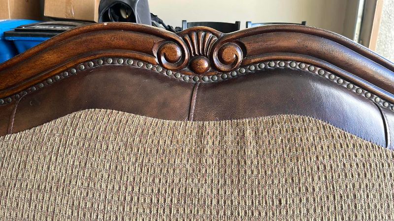 View 4 of BUTTON TUFTED LOVE SEAT WITH LEATHER ARMRESTS AND NAIL HEAD TRIM 68” X 41” H 44”