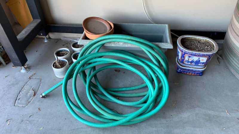 View 5 of GARDEN HOSE AND ASSORTED POTS
