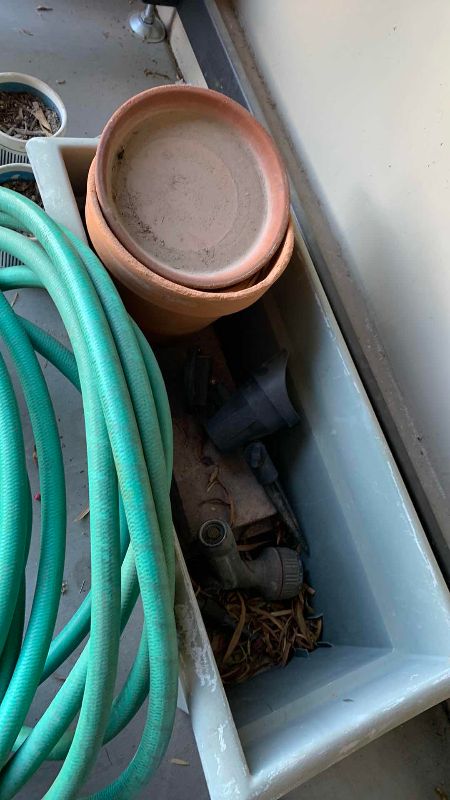 View 2 of GARDEN HOSE AND ASSORTED POTS