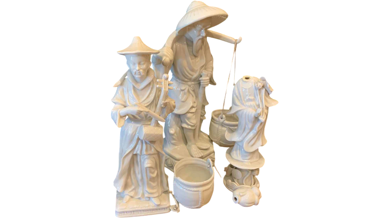 View 1 of VINTAGE WHITE PORCELAIN ASIAN WATER CARRIER AND MUSICIAN FIGURINES TALLEST 13 INCHES