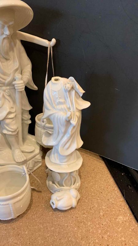 View 4 of VINTAGE WHITE PORCELAIN ASIAN WATER CARRIER AND MUSICIAN FIGURINES TALLEST 13 INCHES