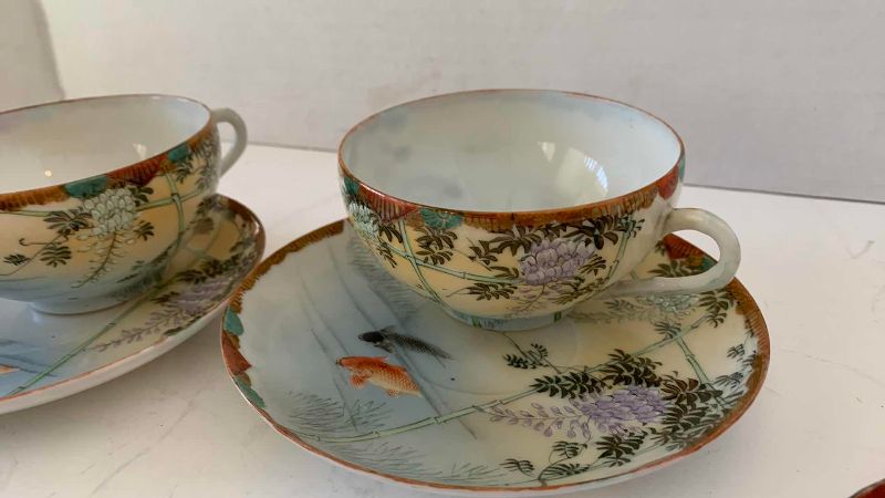 View 3 of VINTAGE JAPANESE GOLDFISH THEMED HANDPAINTED, SAUCERS, CUPS, AND SPOON