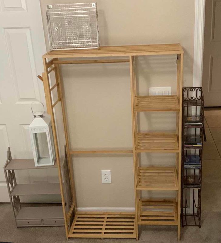View 1 of WOODEN SHELVING 34“ X 12“ H 56” METAL CD RACK, MAGAZINE, RACK, AND OTHER HOME ITEMS