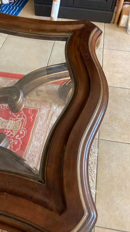 View 5 of MARGE CARSON, COFFEE TABLE WITH GLASS TOP CURVED, SCROLL LEGS 58" BY 39" H 21”