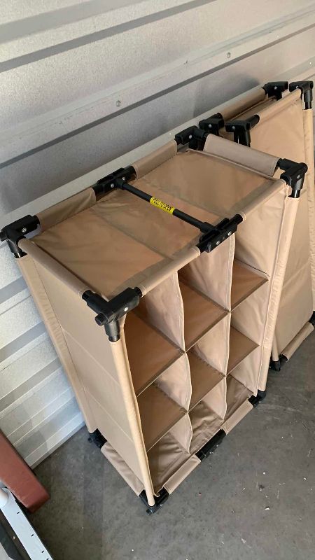 Photo 1 of 2 COLLAPSING SHOE RACKS