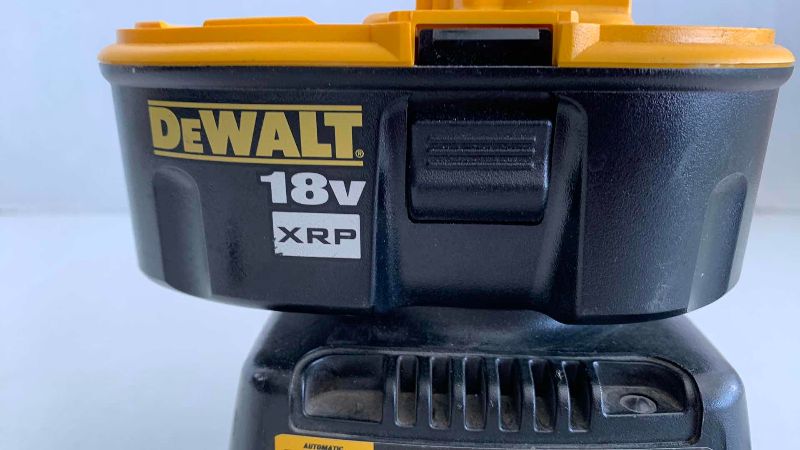 Photo 1 of DEWALT 18 V BATTERY AND CHARGER