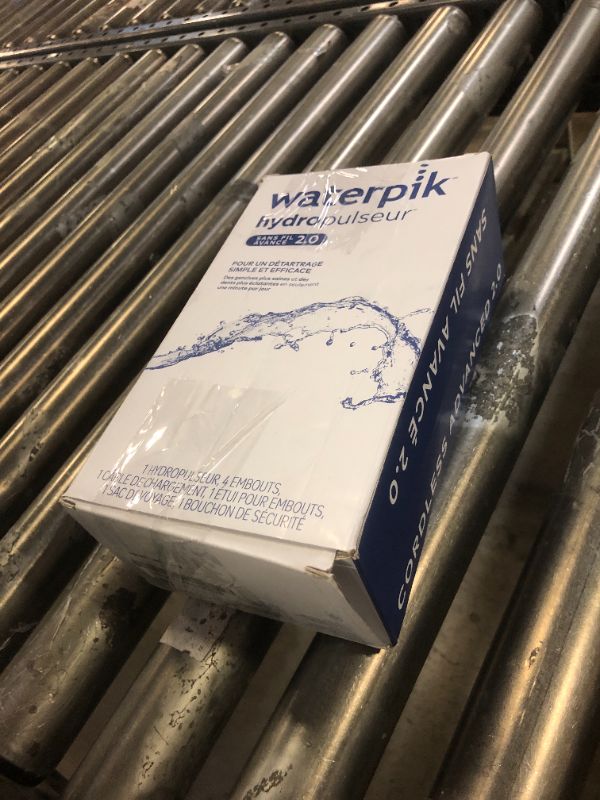 Photo 1 of Waterpik Cordless Advanced 2.0 Water Flosser For Teeth, Gums, Braces, Dental Care With Travel Bag and 4 Tips, ADA Accepted, Rechargeable, Portable, and Waterproof, Blue WP-583, Packaging May Vary