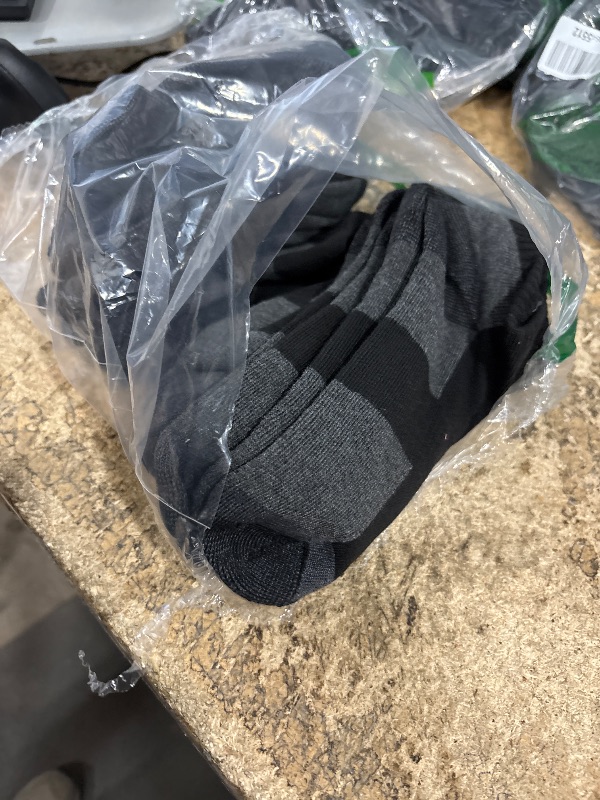 Photo 1 of 10 pairs of all size socks