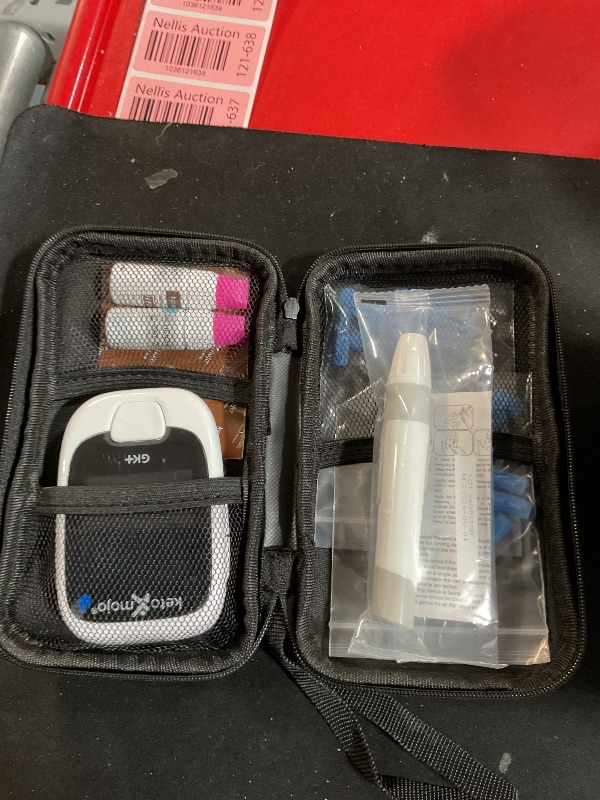 Photo 1 of (PARTIAL SET) (MISSING ACCESSORIES) 
KETO-MOJO GK+ Bluetooth Glucose & Ketone Testing Kit + Free APP for Ketosis & Diabetes Management. 20 Blood Test Strips (10 Each), Meter, 20 Lancets, Lancing Device, and Control Solutions