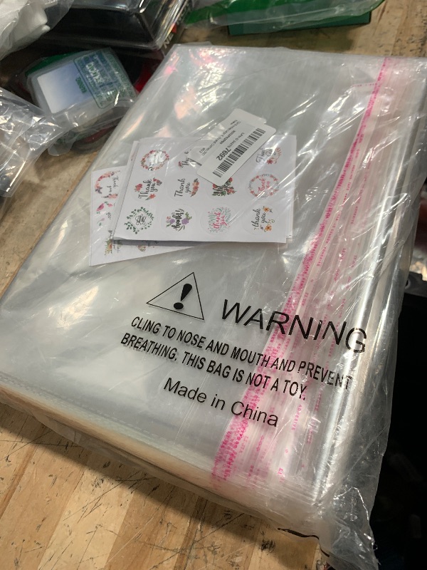 Photo 1 of 12x16 inches Large Clear Resealable Cellophane Bags for Packaging Products 300ct Plastic Self-sealing Gift Bags Self Adhesive Bags for Gifts,Clothes, Small Business, Thank you Stickers