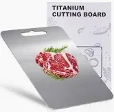 Photo 1 of 100% Titanium Cutting Board for Kitchen - Dishwasher Safe Chopping Boards with Handle, Reversible Charcuterie Board for Home Counter Outdoor Camping Housewarming Gifts for Women (13.3 x 9)