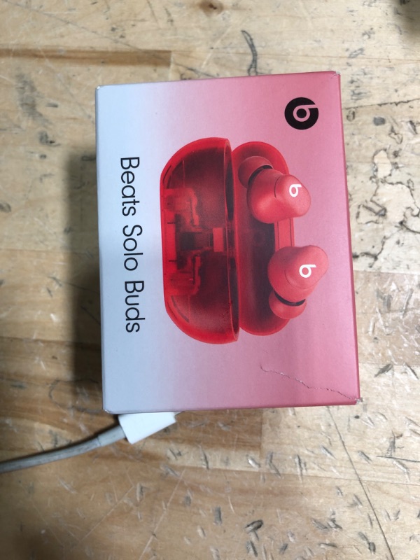 Photo 1 of Beats Solo Buds - Wireless Bluetooth Earbuds | 18 Hours of Battery Life | Apple & Android Compatibility | Built-in Microphone - Transparent Red