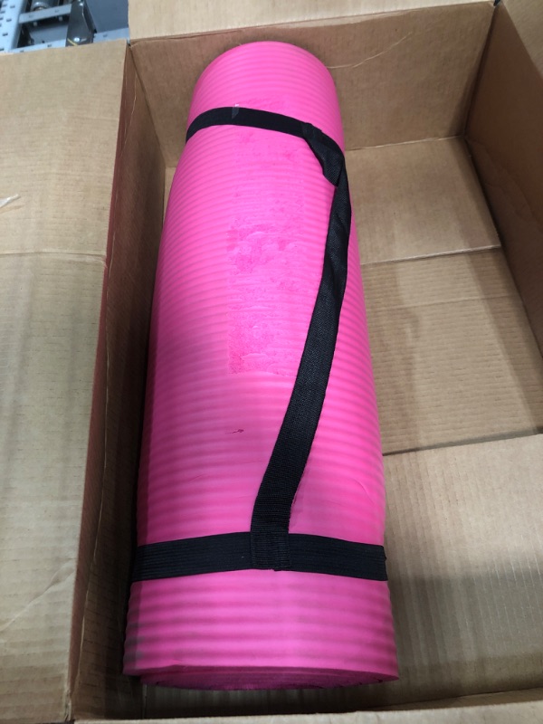 Photo 1 of Amazon Basics 1/2 Inch Extra Thick Exercise Yoga Mat with Carrying Strap, Pink