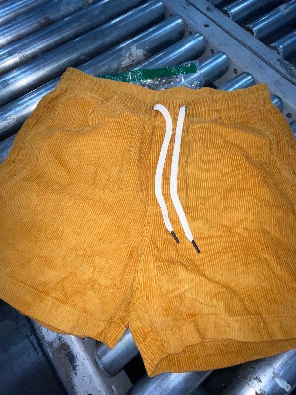 Photo 1 of Amazon Essentials Men's Classic-Fit Stretch Golf Short (Available in Big & Tall), Apricot Orange, 38