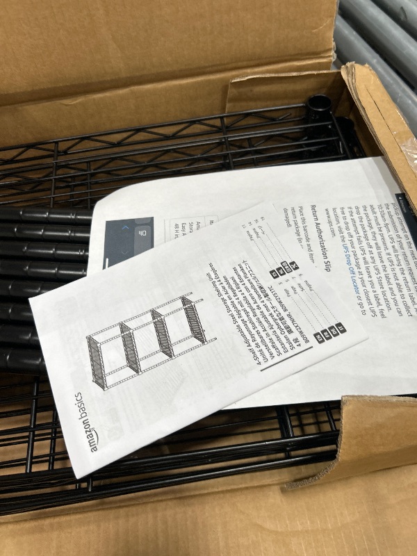 Photo 1 of Amazon Basics 4-Shelf Steel Wire Storage Rack, Adjustable, Sturdy, Easy Assembly, 13.4 D x 23.2 W x 48 H in, Black